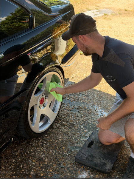 ZP Valets hand-drying a wheel and arch during a valet