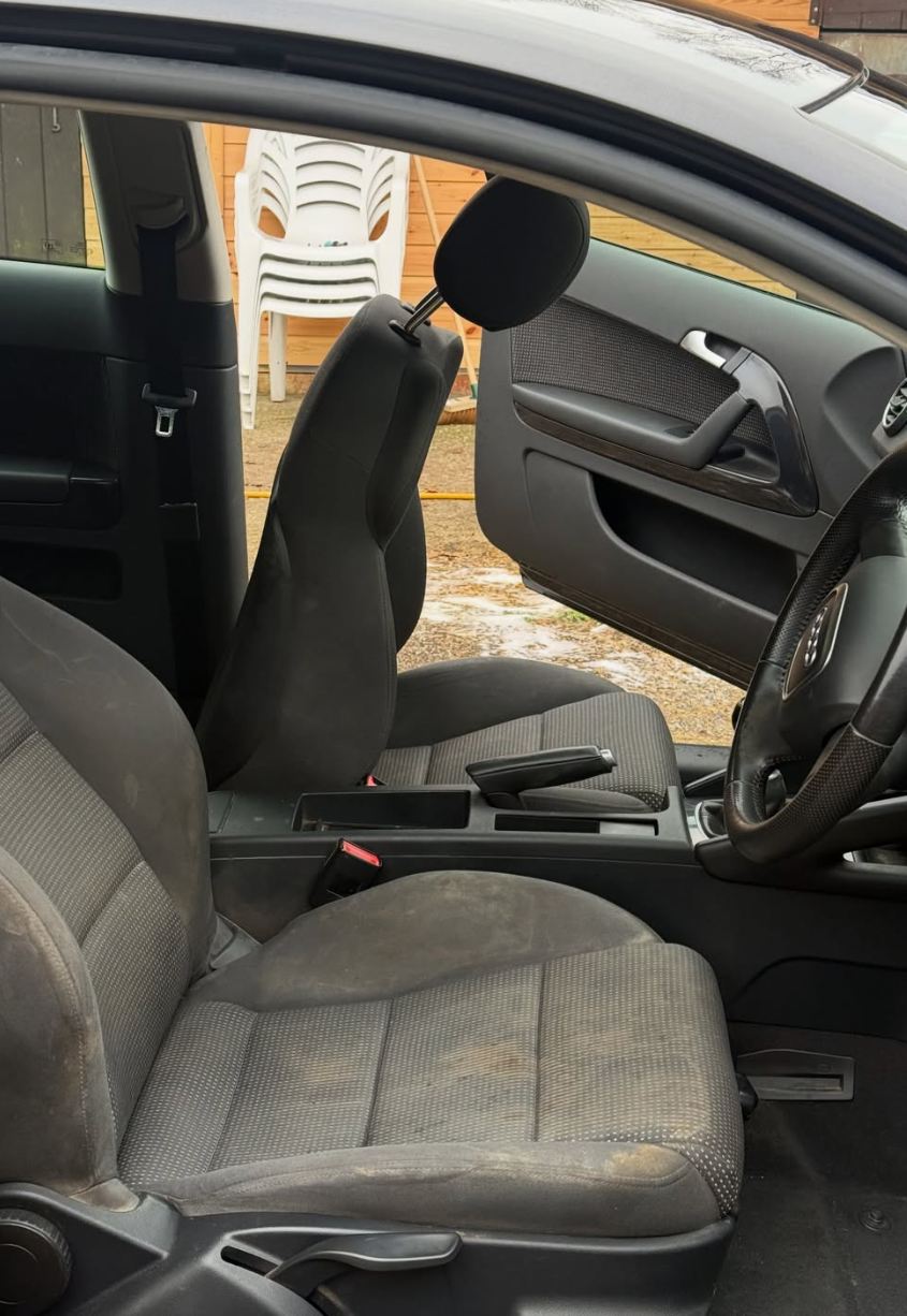 Audi interior before deep clean — stained seats